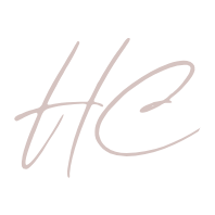 Elegant cursive signature in black on a transparent background, featuring the initials "hc.