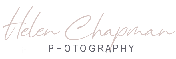 Logo of "helen chapman photography" featuring elegant, cursive lettering in black on a transparent background.
